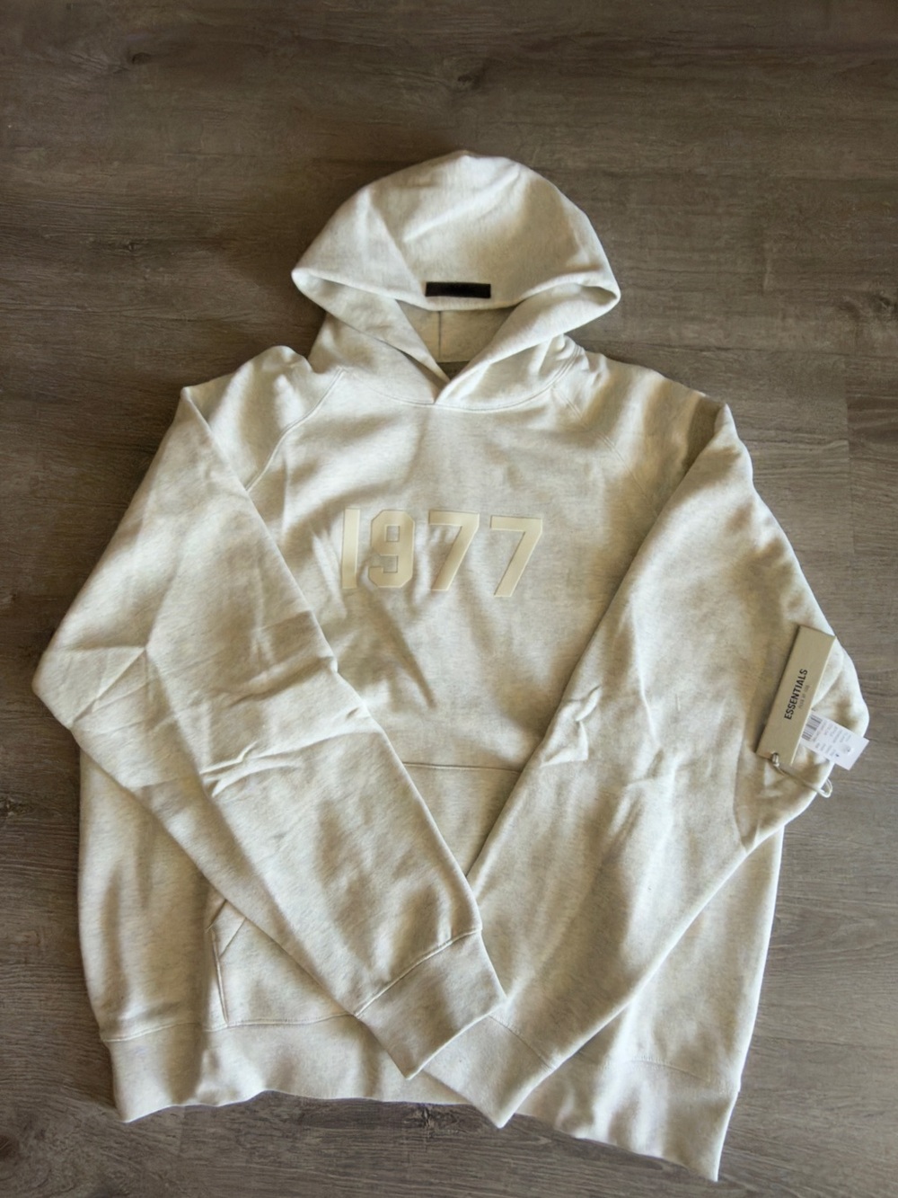 Essentials Men's Hoodie in Light Oatmeal with 1977 Chest Graphic